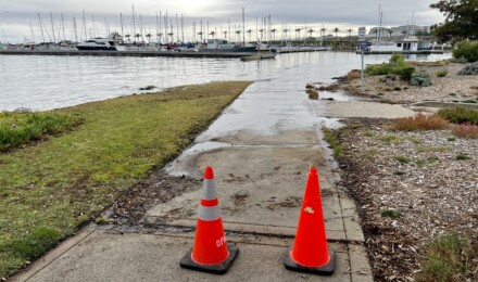 Water from the SF Bay covering a paved walkway